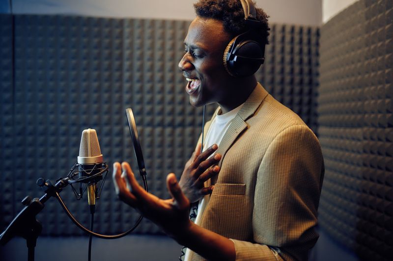 Voice actor recording in a professional studio